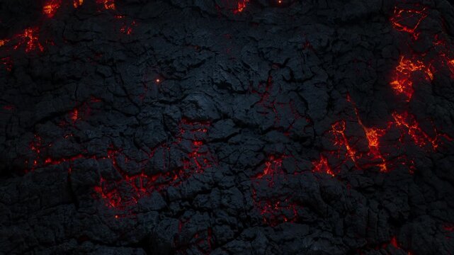 Close-up shot of lava surface with melting magma and flying particles
