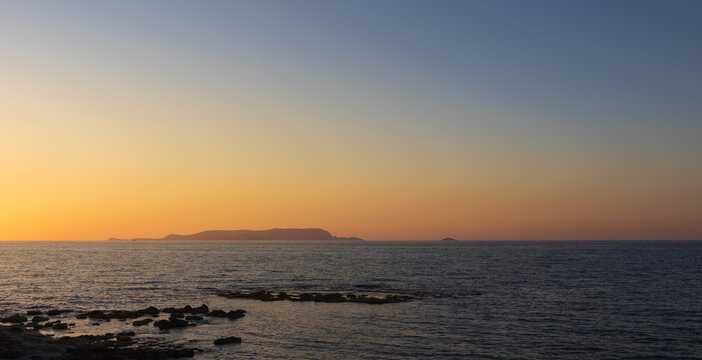 Scenic view to Dia island on north of Crete. Travel background