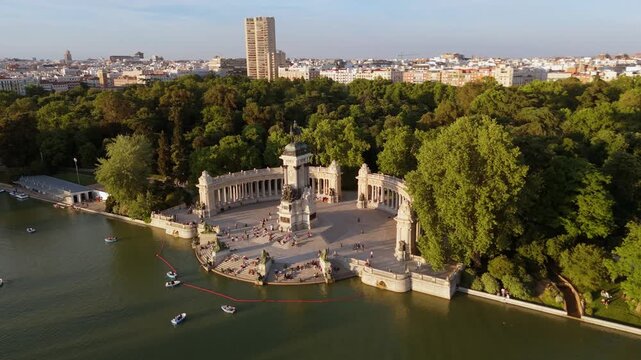 Drone tracking shot of Alfonso XII monument in El Retiro park
