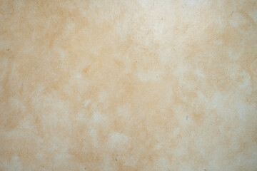 Obraz premium Abstract Light Brown Stucco Wall Texture Background with Brush Strokes