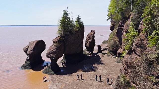 Experience Hopewell Cape Flower Pot Rocks during low tide at sunrise in Hopewell Rocks Provincial Park. Witness the natural beauty of Canada&rsquo;s highest tides