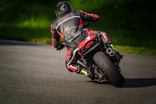 Regular training in Riga, Latvia, Bikernieki on 12-05-2026  Motorcyclist leaning on a curved road