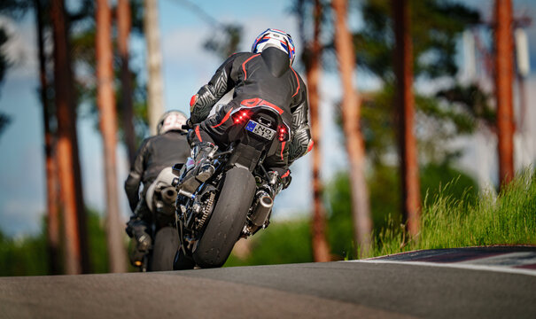 Regular training in Riga, Latvia, Bikernieki on 12-05-2026  Motorcyclist performing a wheelie on a track