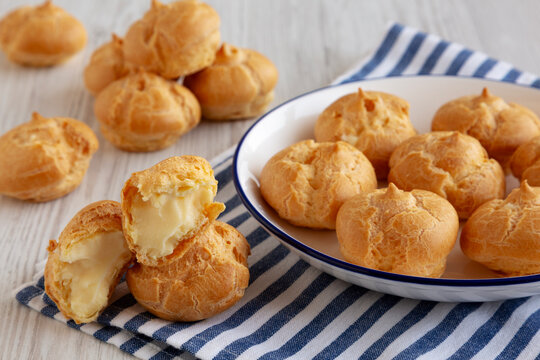 Homemade Mini Cream Puff with Whipped Filling, side view.