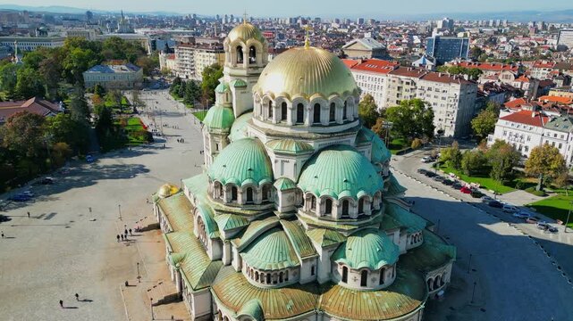 Majestic aerial view of the stunning gold domed St. Alexander Nevsky Cathedral, an iconic landmark in the heart of Sofia, Bulgaria