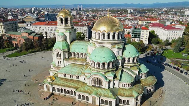 Magnificent aerial view of the iconic St. Alexander Nevsky Cathedral in Sofia, Bulgaria, revealing its golden domes and Neo Byzantine architecture
