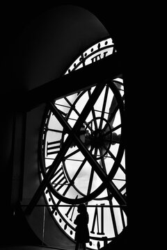 the Mus&eacute;e d'Orsay clock and a little girl in black and white 