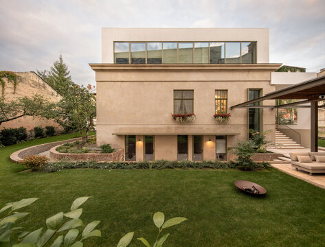Backyard view of renovated modern house