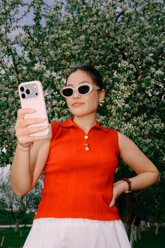 Woman using smartphone outdoors