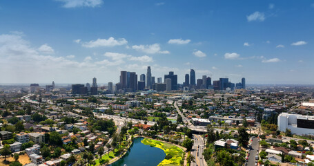 Naklejka premium Los Angeles skyline with skyscrapers. Los Angeles downtown cityscape. Los Angeles business district view. Los Angeles freeway with traffic.