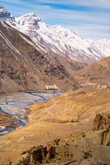 Vertical Panoramic View of the Winding Spiti River Valley and Snow-Capped Himalayan Peaks from the Rugged Cold Desert Terrain Near Dhankar Monastery in Himachal Pradesh, India © DS_Photography