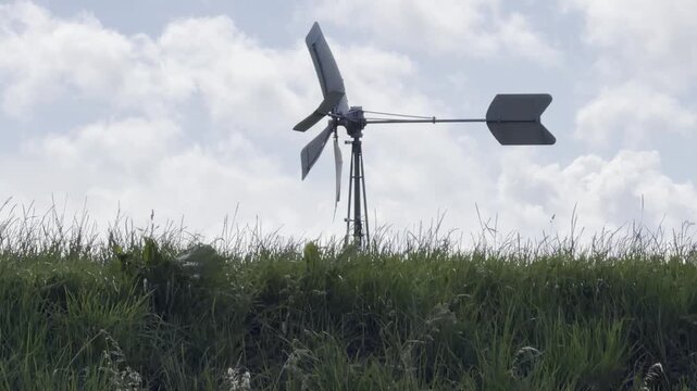 Spinning agricultural wind pump summer timelapse