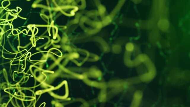 Green and yellow abstract light trails with glowing chaotic scribbles