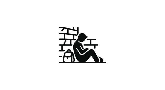A person sitting alone on the ground.