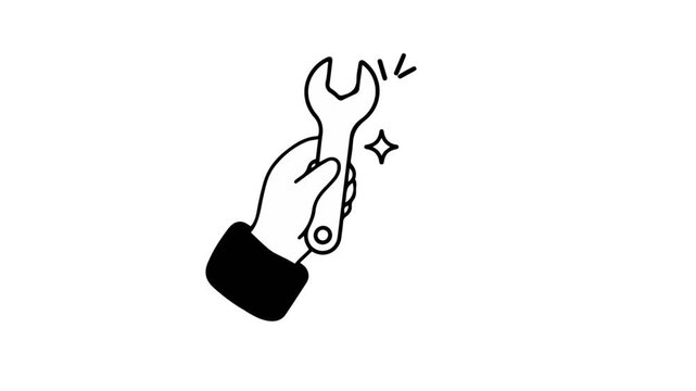 Hand holding a shining wrench tool for maintenance and repair