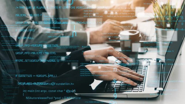 A modern workspace showcasing hands typing on a laptop with coding overlay, illustrating digital technology and collaboration in software development and innovation. Xenic