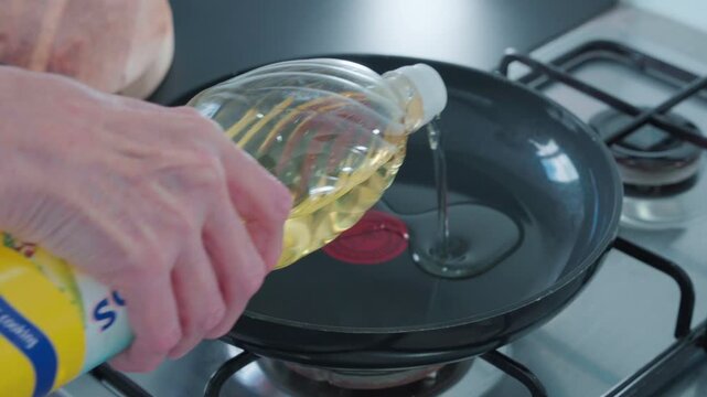 The Preparation of frying an egg in frying pan 