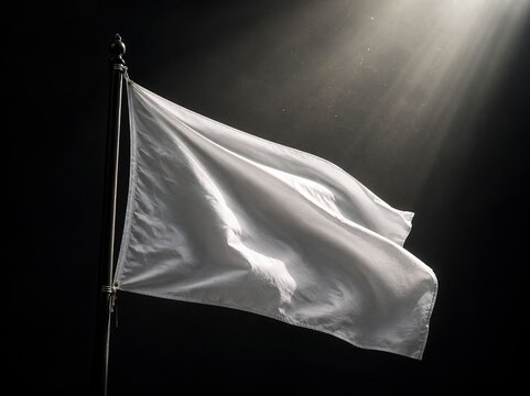White flag waving. End of war, surrender, defeat, ceasefire, peace negotiations, humanitarian resolution, reconciliation, and hope after conflict. For global affairs, international diplomacy, military