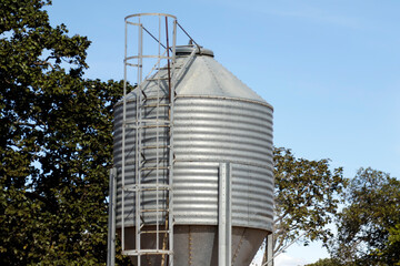 Corrugated Galvanized Steel Agricultural Storage Silo with Conical Hopper Bottom © sidneydealmeida