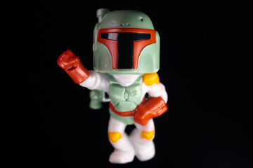 Naklejka premium Kinder Surprise Lucasfilm Boba Fett on the black background
