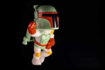 Naklejka premium Kinder Surprise Lucasfilm Boba Fett in a fighting position strikes in a jump
