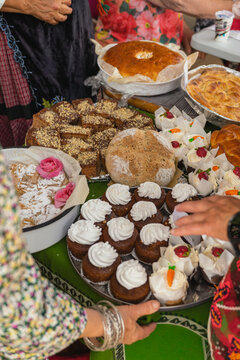 Traditional breads and pastries at Kazanluk Rose Festival. Bread, banitsa, pogacha, cakes, sweets are displayed on table, Kazanluk, Bulgaria. Bakery, heritage, bread culture, bulgarian cuisine