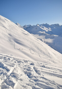 Backcountry skiers at Tincan Mountain in Turnagain Pass Alaska
