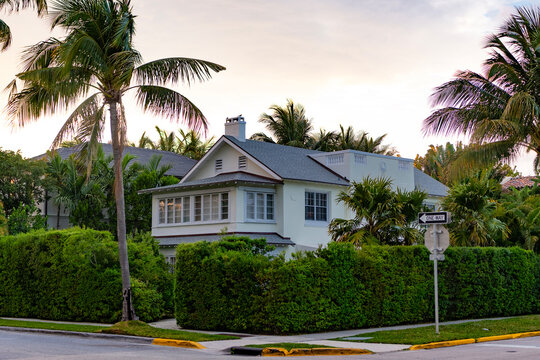 Private house in suburban area. Suburban house architecture. Suburb private exterior with palm tree. Suburban neighborhood. Private family cottage architecture. House exterior. Private life