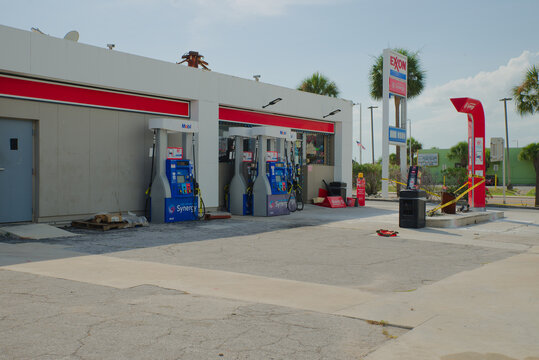 Exxon Gas Station Under Construction With Dirt Piles and Broken Pavement Outside Convenience Store Editorial Use Only St. Pete Beach, FL USA June 10, 2026. rusted pipe, conveying repair work, urban ma