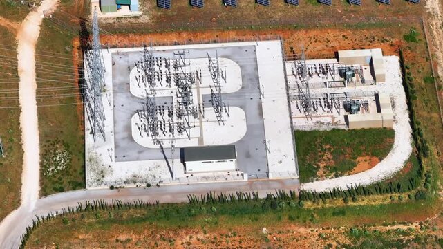 Solar power plant infrastructure with photovoltaic panels and clean energy generation site overview