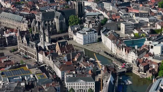 An panoramic aerial view around the old town in the city of Gent or Ghent on a sunny summer noon in Belgium