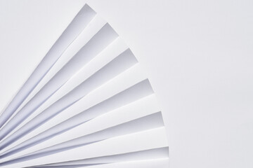 Abstract background from folded paper on plain paper, copy space for text