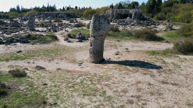Captivating aerial footage showing the unique natural rock formations of Pobiti Kamani, also known as the Stone Forest, in Bulgaria