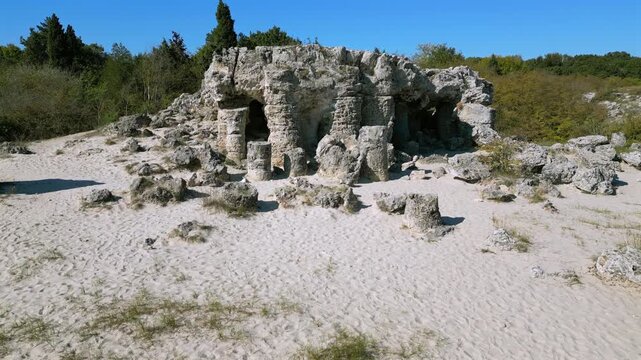 Natural rock formations in Pobiti Kamani, also known as the Stone Forest. This desert like natural phenomenon is located near Varna, Bulgaria