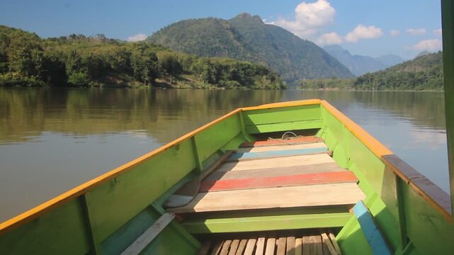 Boat travelling on Nam Ou river, Laos