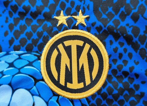 Photo of the detailed golden embroidered badge of Football Club Internazionale Milano, a celebrated Italian football club from Milan, Lombardy.