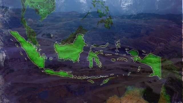 Bright green highlighted map of Indonesia overlaid on a background of a massive terraced open-pit mine. Resource exploitation concept.
