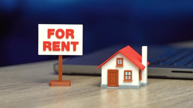A sign for rent is placed near the house. Private home rental market. Real estate services, leasing agreements, and property management support tenant search, residential opportunities