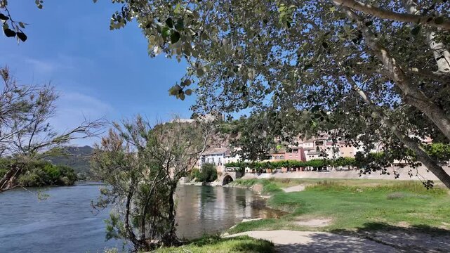 Miravet village and templar castle perched on a hill above the ebro river