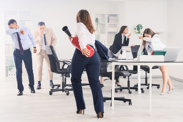 Fototapeta premium Office fire safety training with employees reacting to smoke and a woman holding a fire extinguisher, a woman holds a fire extinguisher, ready to address the emergency
