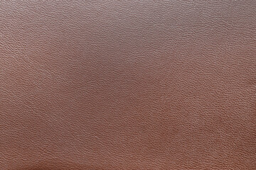 Fototapeta premium Brown leather texture background with fine grain pattern, natural material surface for upholstery and design projects