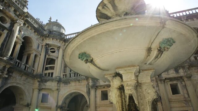 Tomar, Portugal - August 10, 2017: Bottom 360 degrees round view of claustro de D. Joao III, courtyard with fountain of Convent of Christ in Templar Castle. Unesco Heritage and popular in Europe.