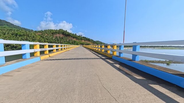 Immersive 4K Vertical POV Crossing a River Bridge toward Scenic Mountains with Engine Ambience