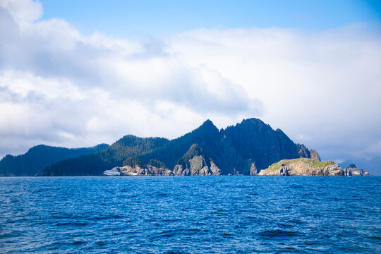 mountain landscape with blue sky and sea