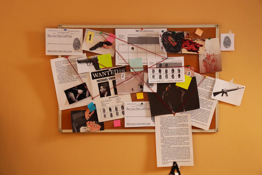 Crime investigation board with evidence fingerprints wanted poster and red string connecting clues for solving a mystery