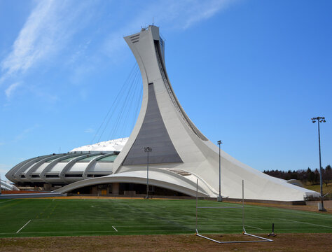 Quebec Montreal Olympic Stadium and tower. It's the tallest inclined tower in the world.Tour Olympique stands 175 meters tall and at a 45-degree angle. 