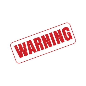 Red rectangular rubber stamp with the word WARNING imprinted on a white background