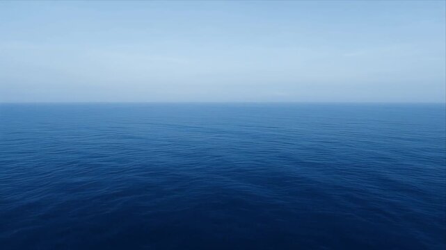 NatureOpen ocean horizon deep blue water calm sea aerial view with slow drone over vast seascape, clear sky, gentle wave, tranquil marine nature travel background