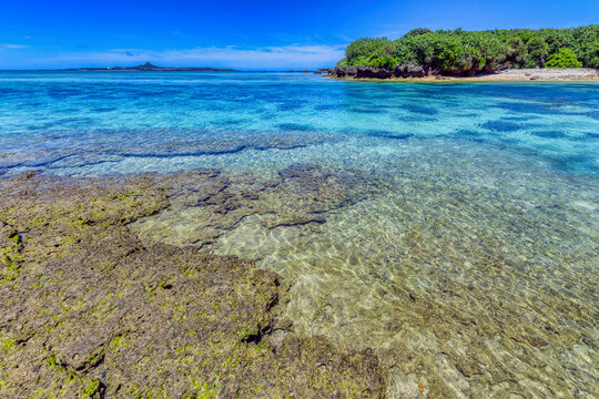 Bise Zaki (also known as Cape Bise) is a stunning, natural snorkeling and coastal area on the northwestern tip of Okinawa's Motobu Peninsula. Iejima island in the distance.