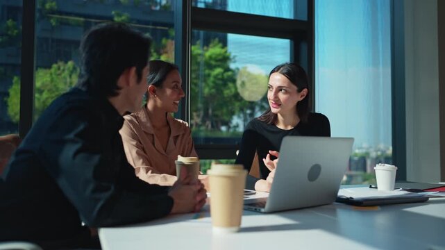 The business team is brainstorming and discussing ideas for a new assigned project before presenting them to senior management for consideration